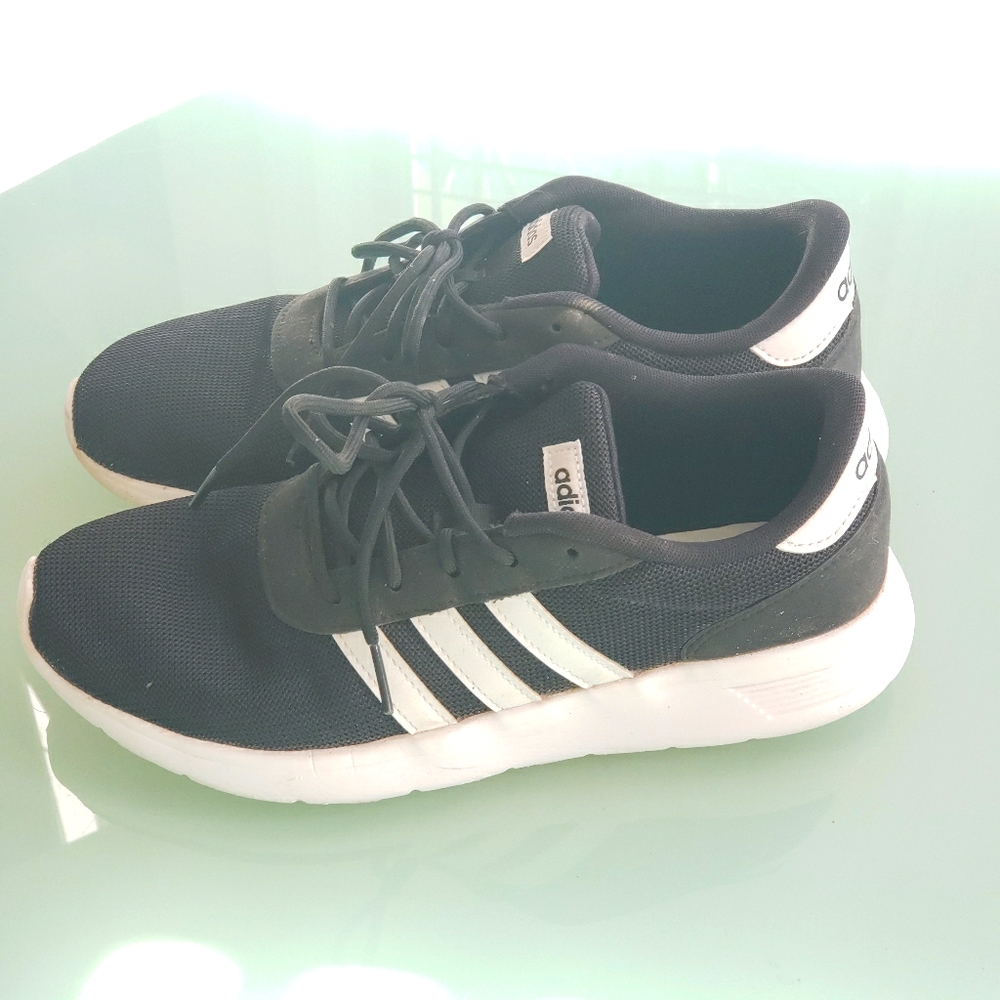 Adidas - women's shoes in black with white stripes